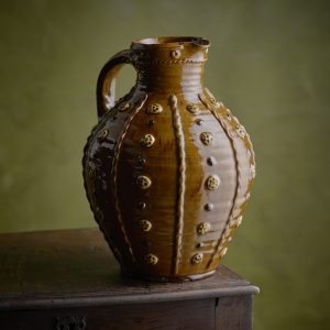 Applique bellied jug