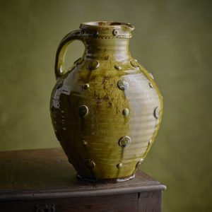 Round bellied applique jug