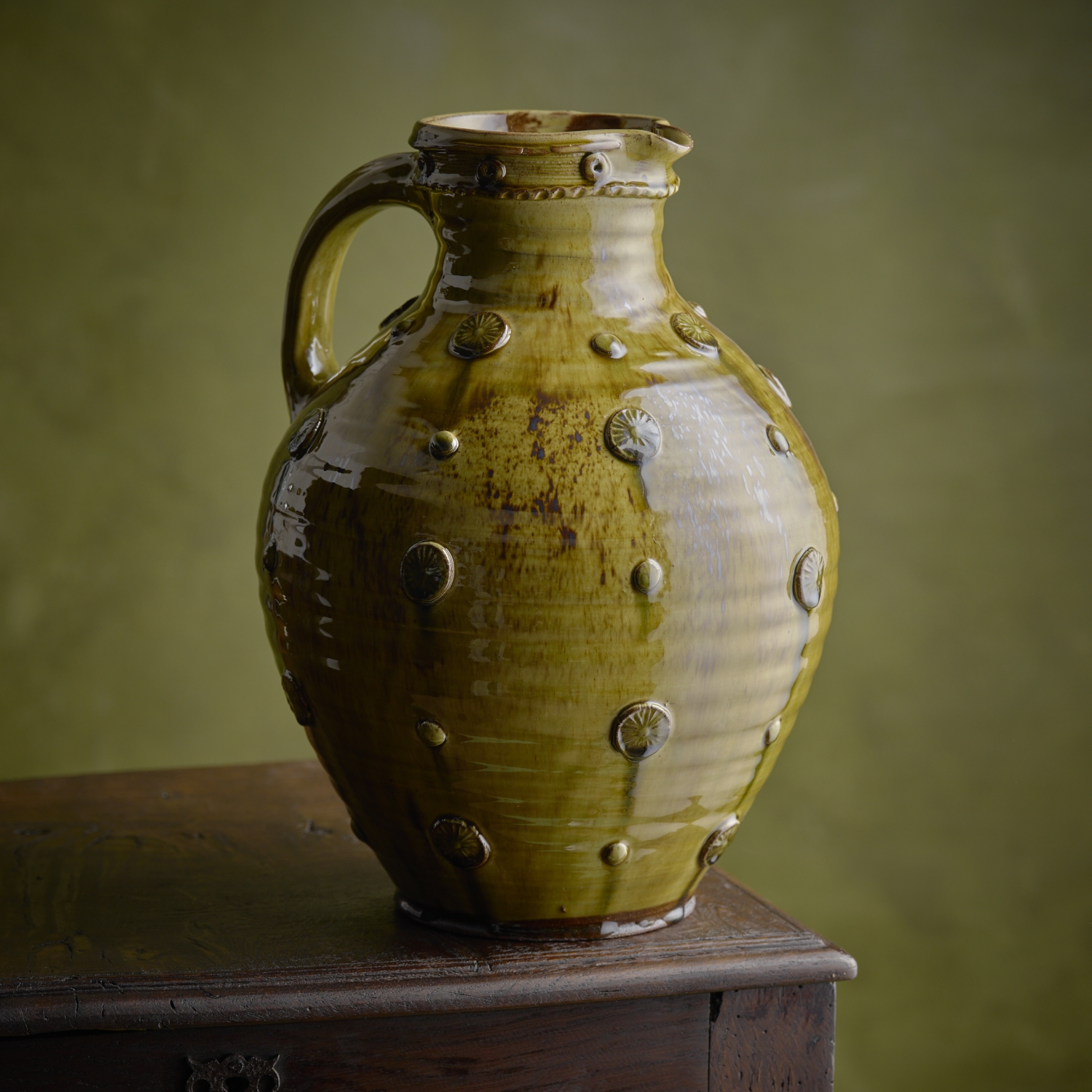 Round bellied applique jug